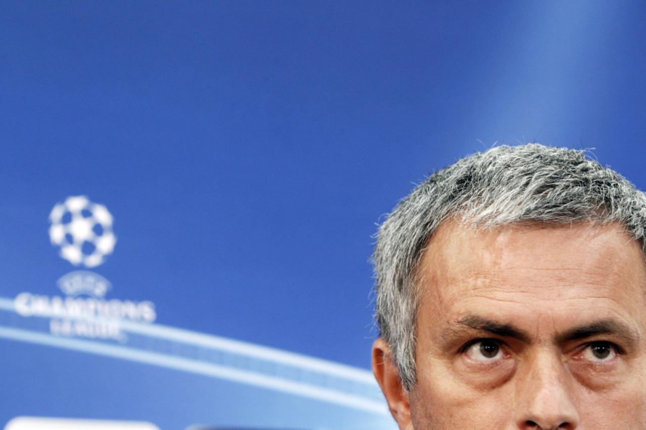 'Real Madrid\'s coach Jose Mourinho listens to a question during a news conference in Nicosia March 26, 2012. Real Madrid plays against APOEL Nicosia in a Champions League quarter-final soccer match o