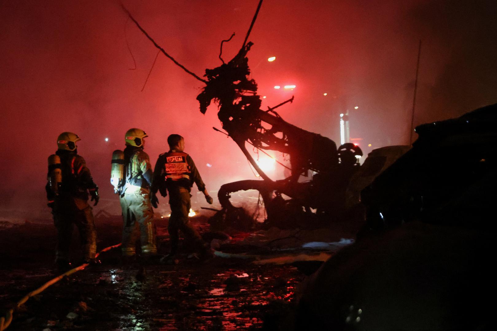 Emergency personnel operate after missiles were launched from Iran to Israel, in Haifa, Israel, June 15, 2025. REUTERS/Shir Torem Photo: SHIR TOREM/REUTERS