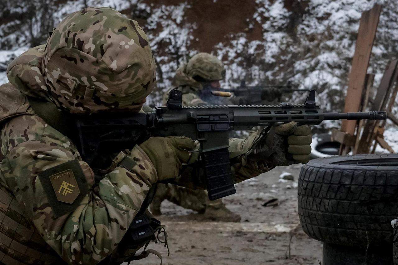 FILE PHOTO: Ukrainian servicemen attend a military exercise between combat missions, in Kharkiv region