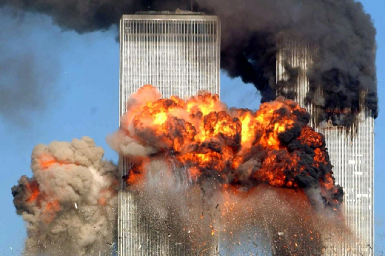 \'NEW YORK - SEPTEMBER 11:  Hijacked United Airlines Flight 175 from Boston crashes into the south tower of the World Trade Center and explodes at 9:03 a.m. on September 11, 2001 in New York City.  Th