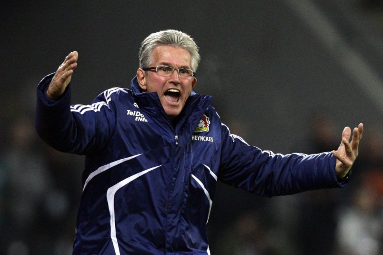 'Bayer Leverkusen's coach Jupp Heynckes reacts during their German Bundesliga soccer match against Bayern Munich in Leverkusen November 20, 2010. Bayer Leverkusen coach Jupp Heynckes will leave at t