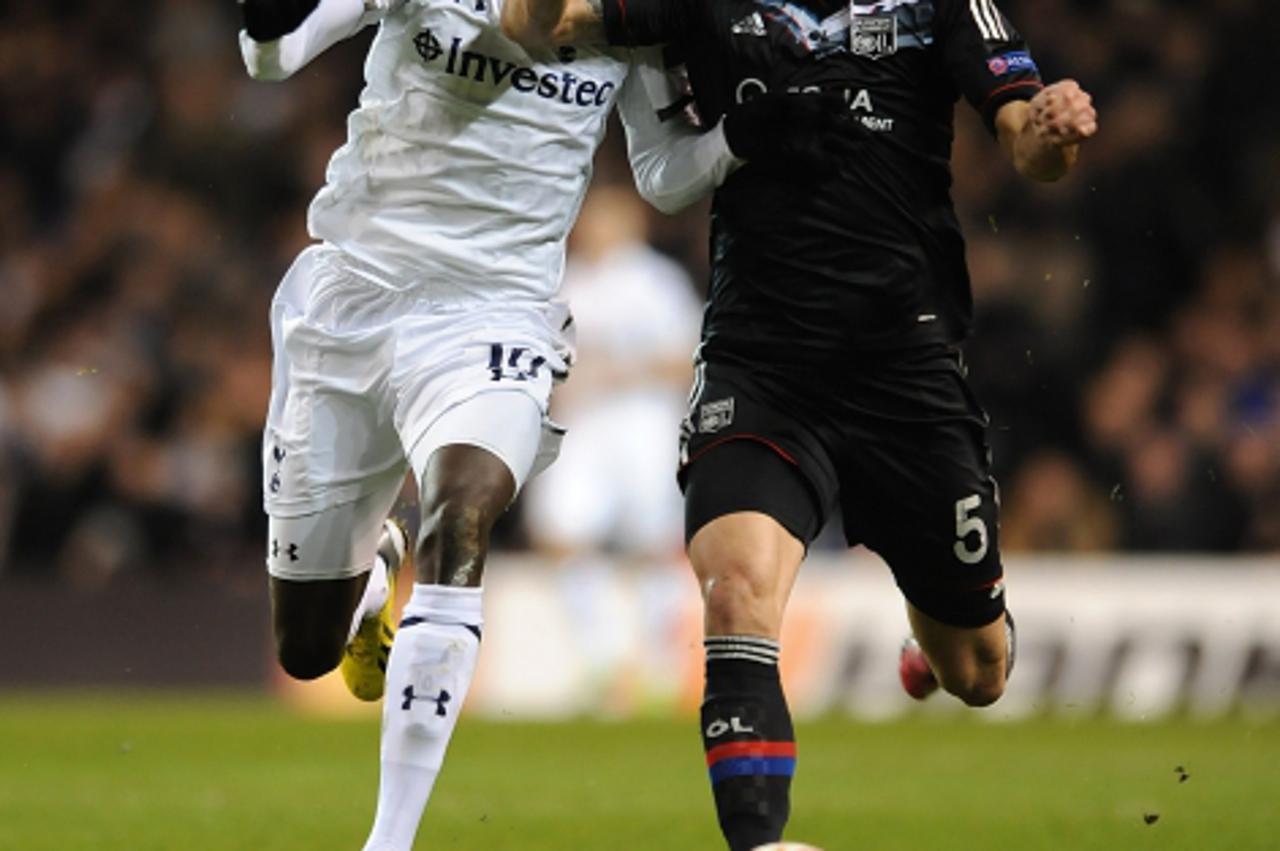 'Tottenham Hotspur\'s Emmanuel Adebayor (left) and Lyon\'s Dejan Lovren (right) battle for the ballPhoto: Press Association/PIXSELL'