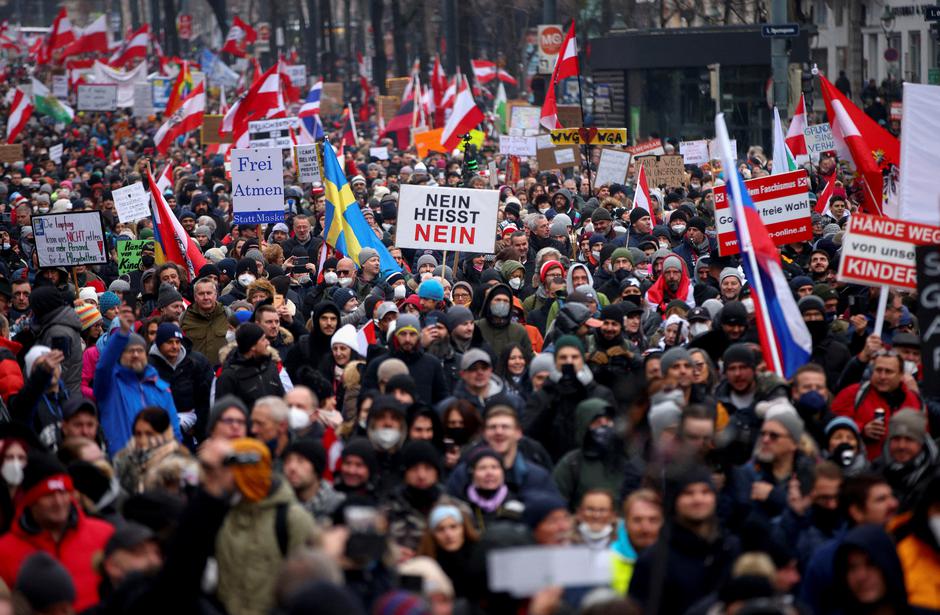 FILE PHOTO: People protest against coronavirus restrictions and the vaccine mandate in Vienna