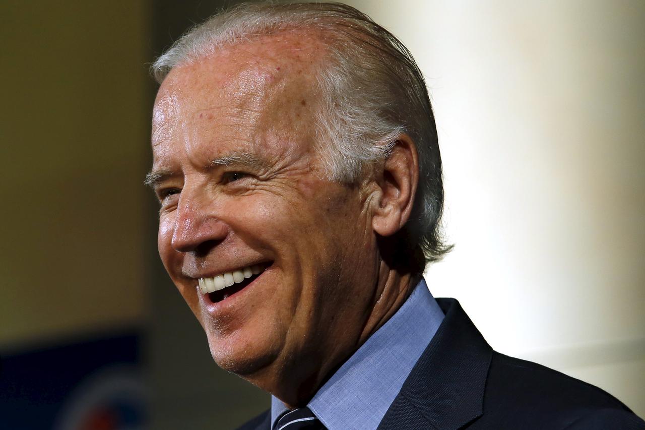 U.S. Vice President Joe Biden smiles as he delivers remarks at the U.S.-Ukraine Business Forum in Washington July 13, 2015. REUTERS/Yuri Gripas