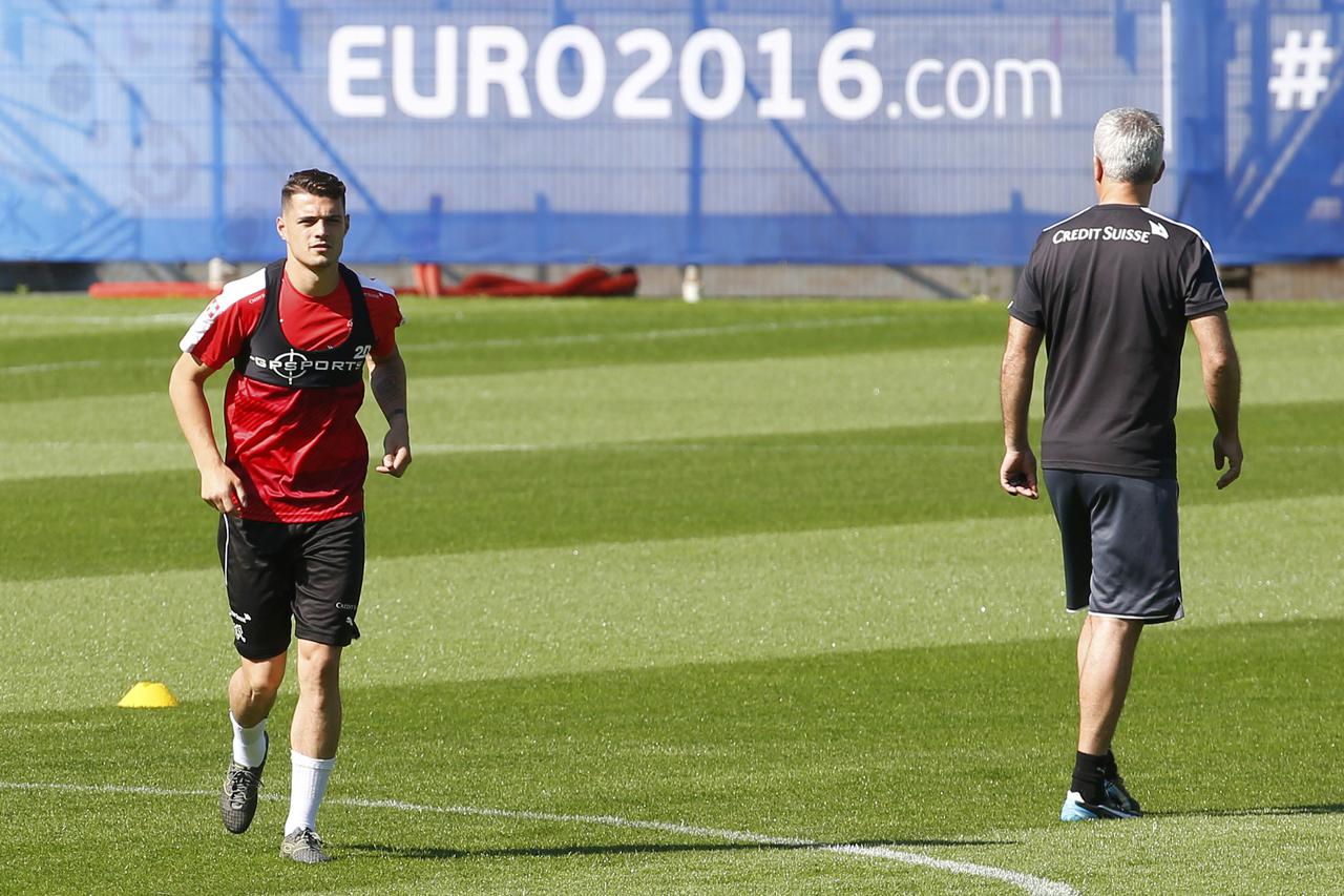 Football Soccer - Euro 2016 - Switzerland Training - Stade de la Mosson - Montpellier 7/6/2016 - Switzerland's coach Vladimir Petkovic and Granit Xhaka during training. REUTERS/Yves Herman