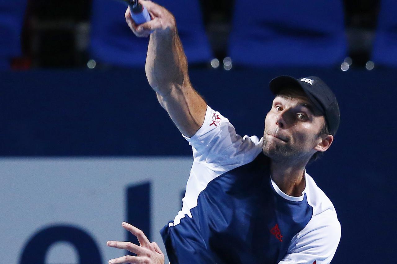 Ivo Karlovic of Croatia returns the ball to Switzerland's Stan Wawrinka during their match at the Swiss Indoors ATP men's tennis tournament in Basel, Switzerland October 28, 2015.   REUTERS/Arnd Wiegmann  Picture Supplied by Action Images