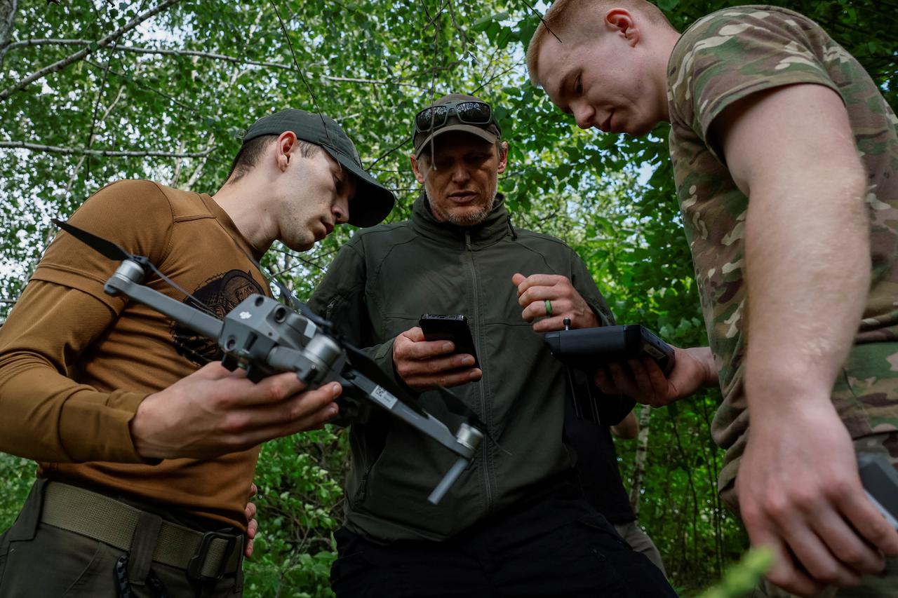 Soldiers practice to operate drones in Ukraine