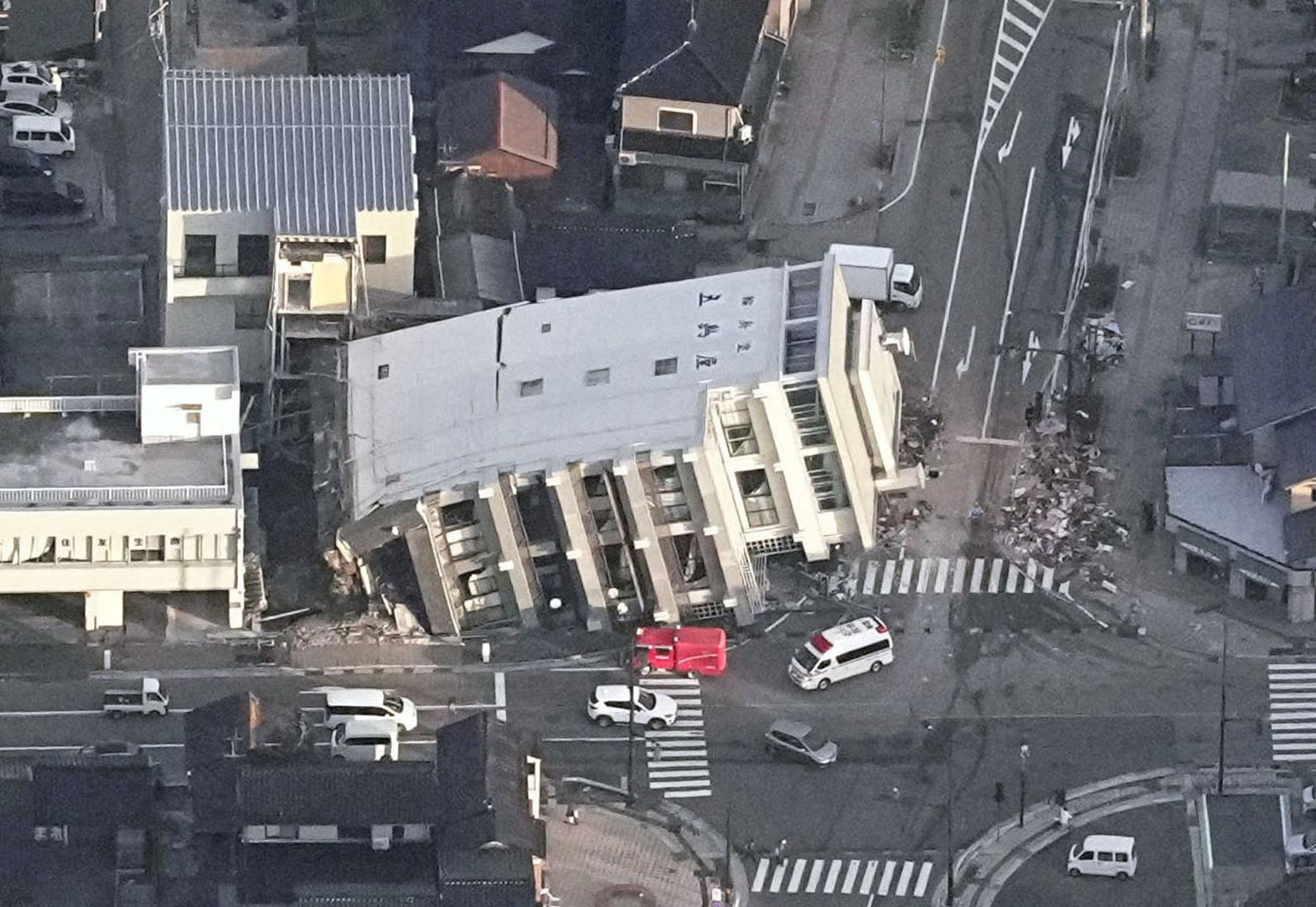 An aerial view shows a collapsed building caused by an earthquake in Wajima, Ishikawa prefecture, Japan January 2, 2024, in this photo released by Kyodo. Mandatory credit Kyodo via REUTERS ATTENTION EDITORS - THIS IMAGE WAS PROVIDED BY A THIRD PARTY. MANDATORY CREDIT. JAPAN OUT. NO COMMERCIAL OR EDITORIAL SALES IN JAPAN     TPX IMAGES OF THE DAY Photo: KYODO/REUTERS