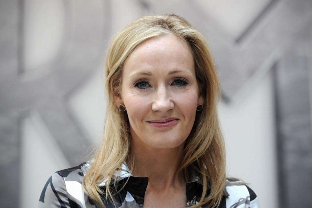 FILE PHOTO: Writer J.K. Rowling poses as she arrives for the European premiere of the film "Fantastic Beasts and Where to Find Them" at Cineworld Imax, Leicester Square in London