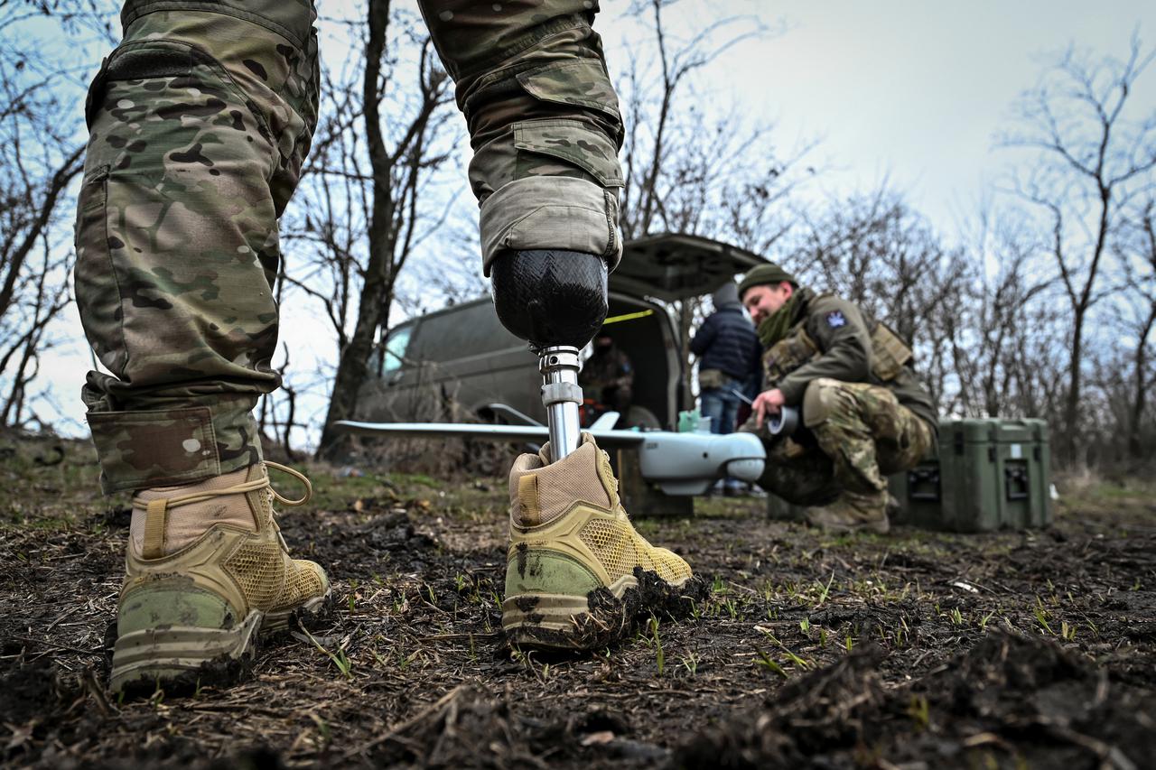 Ukrainian servicemen prepare a reconnaissance UAV at a front line in Zaporizhzhia region