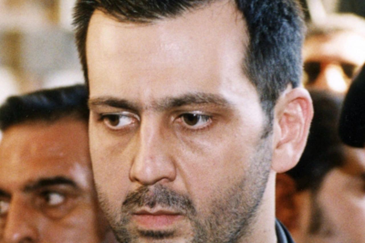 'TO GO WITH STORY BY NATACHA YAZBECK A file handout photo dated June 13, 2000 shows Syrian President Bashar al-Assad\'s brother, Maher, during the funeral of his father, late Syrian President Hafez al