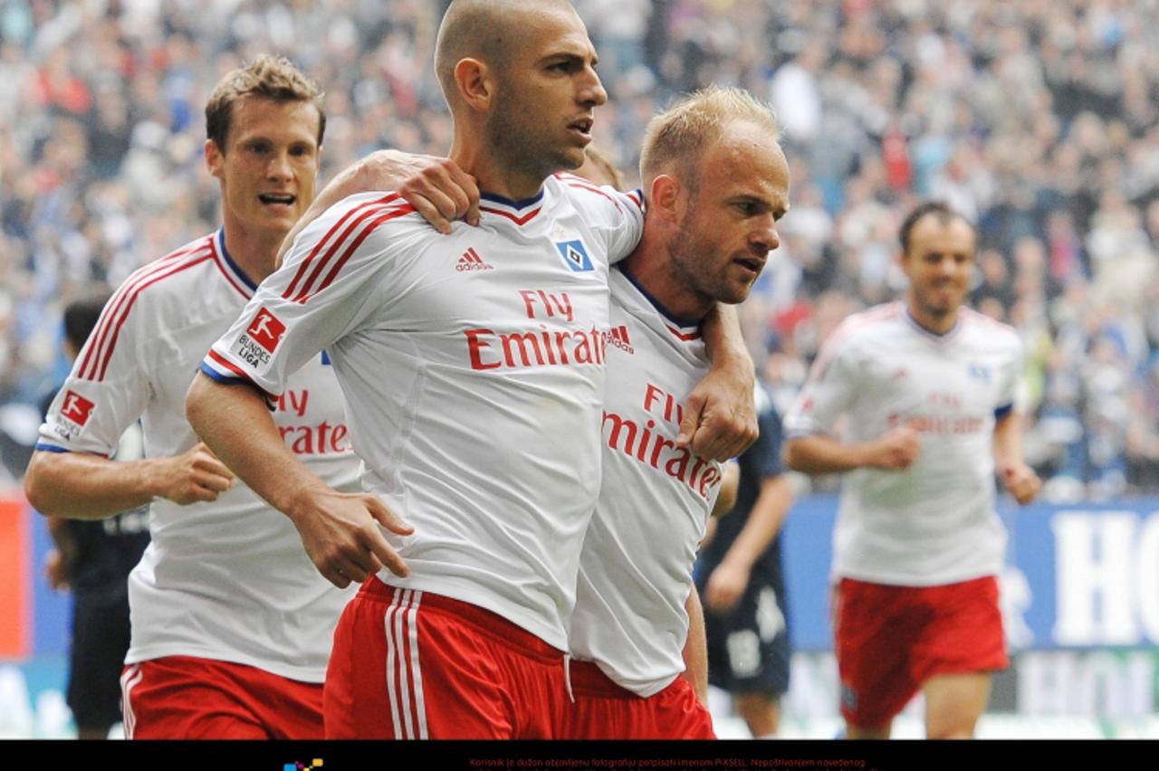 '27.08.2011, Imtech Arena, Hamburg, GER, 1.FBL, Hamburger SV vs 1. FC Köln / Koeln, im Bild Jubel bei Mladen Petric (Hamburg #10, links) und David Jarolim (Hamburg #14)  // during the match Hamburger 