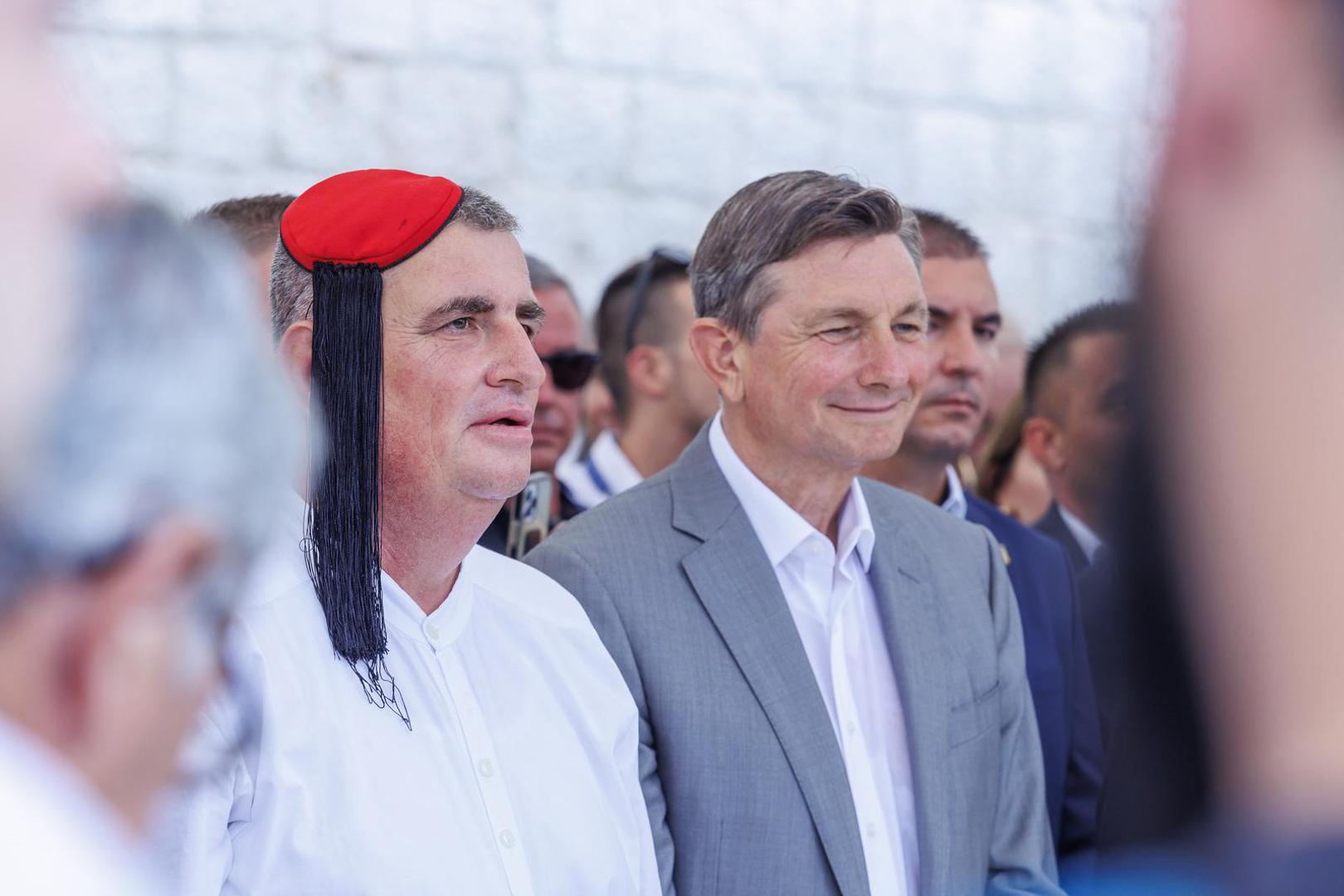 07.08.2022., Sinj - Predsjednik RH Zoran Milanovic, premijer Andrej Plenkovic s ministrima, predsjednik Republike Slovenije Borut Pahor sudjelovali su na Vojvodinom prijemu u Alkarskim dvorima.Miro Bulj, Borut PahorPhoto:   Photo: Miroslav Lelas/PIXSELL