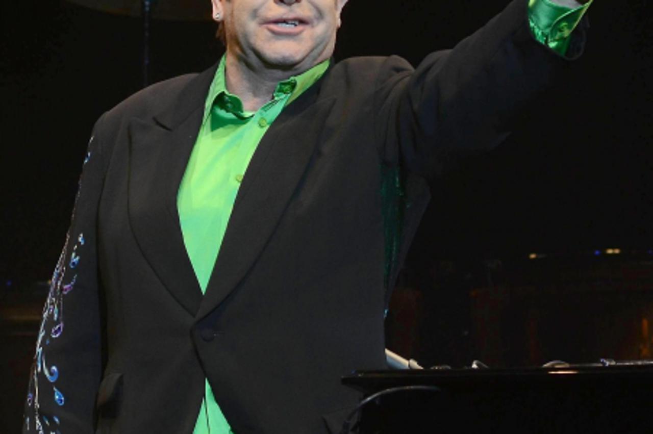 'WORLD RIGHTS EXCEPT IRELAND  Elton John performing at the O2, Dublin, Ireland. 15/12/2010  BYLINE BIGPICTURESPHOTO.COM:   REF:823   USAGE OF THIS IMAGE OR COPY WRITTEN THAT IS BASED ON THE CAPTION, I