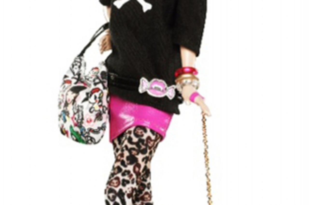 'A limited edition tokidoki Barbie doll is pictured in this undated handout released to Reuters October 27, 2011. With pink hair and tattoos across her shoulders and neck, U.S. toymaker Mattel\'s late