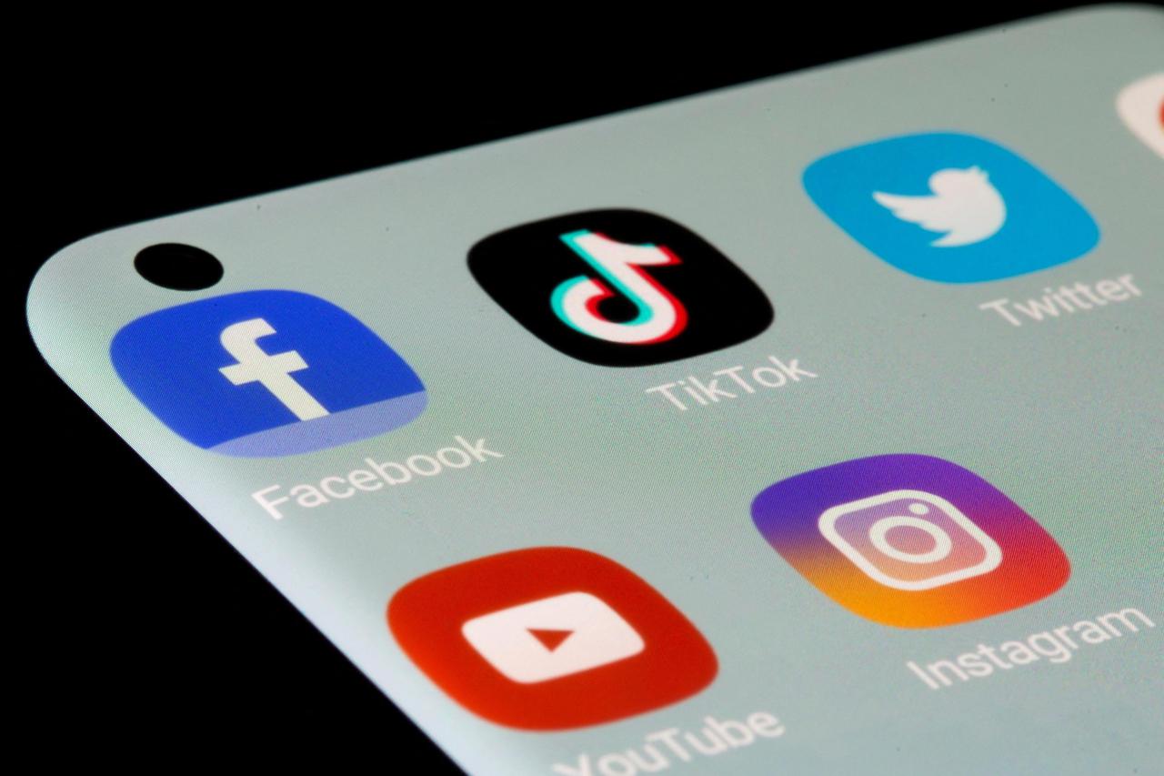 FILE PHOTO: Facebook, TikTok, Twitter, YouTube and Instagram apps are seen on a smartphone in this illustration
