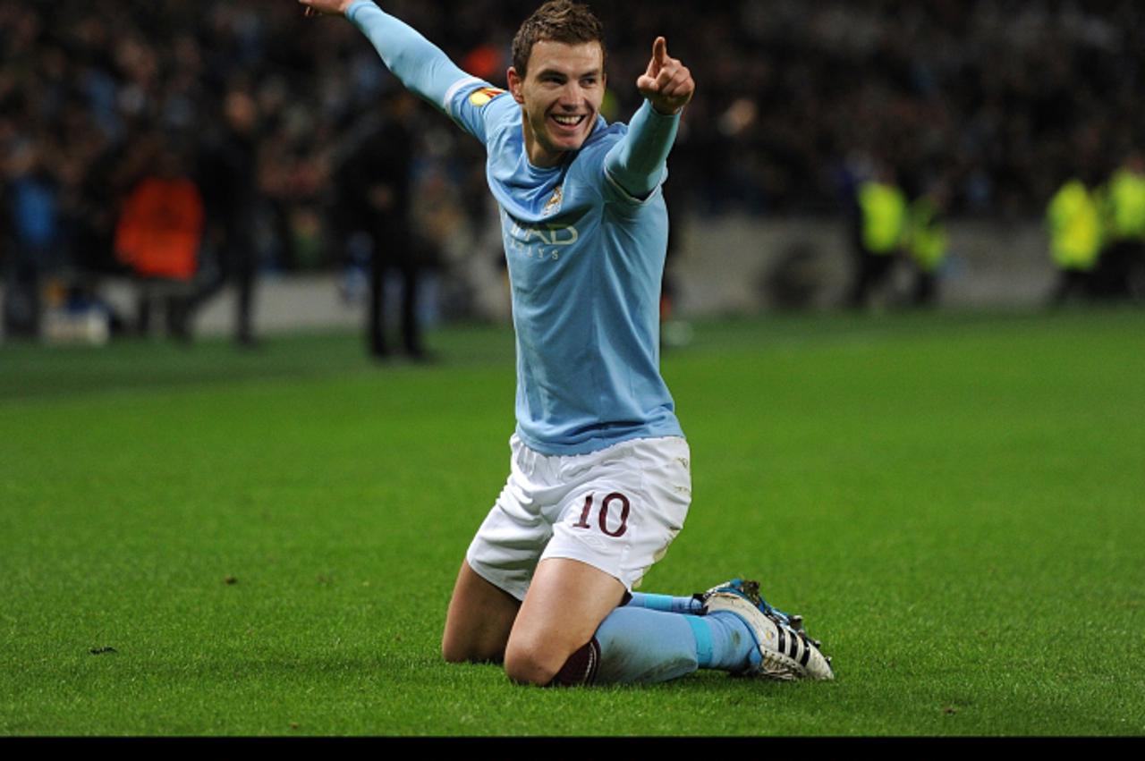 'Manchester City\'s Edin Dzeko celebrates scoring their second goal of the game  Photo: Press Association/Pixsell'