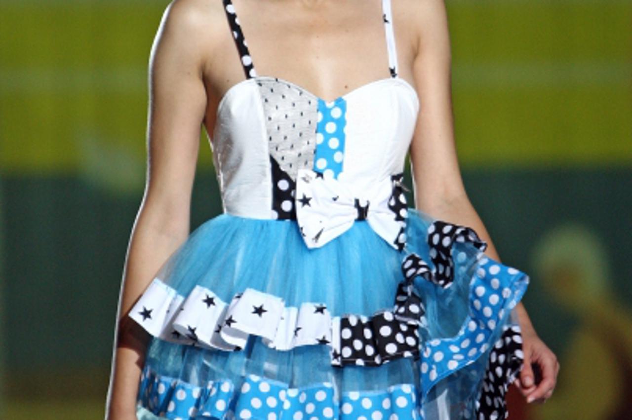 '13.06.2013., Bol - Na poznatoj plazi Zlatni rat odrzana je druga vecer cetvrtog izdanja ljetnog modnog dogadjanja Perwoll Fashion.hr cruise collection. Revija Zoran Aragovic Photo: Borna Filic/PIXSEL