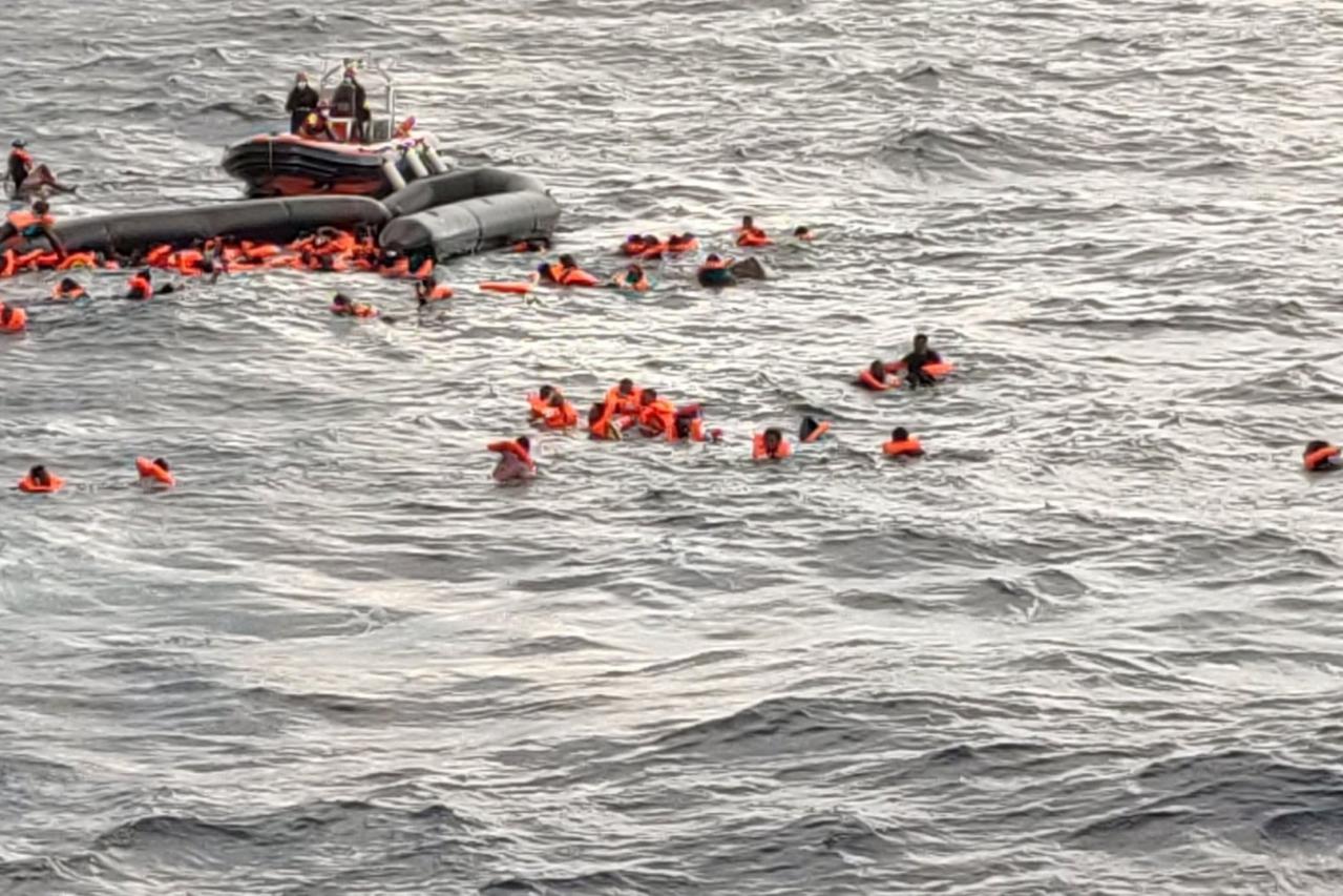 Migrants at sea waiting to be rescued by Spanish search and rescue ship Open Arms in the Mediterranean Sea