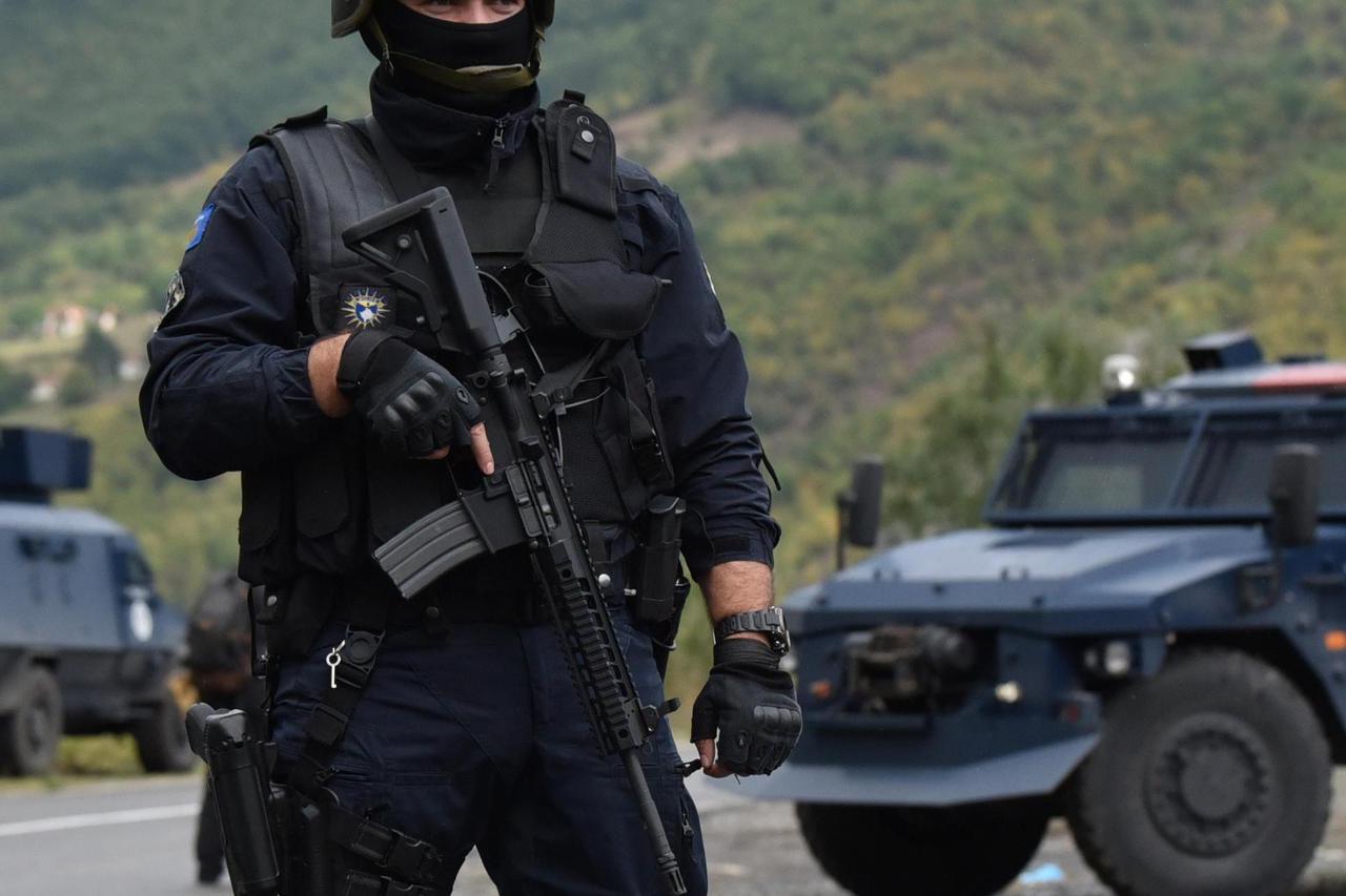 Kosovo special police with armoured vehicles are pictured as hundreds of Kosovo Serbs protest against a government ban on entry of vehicles with Serbian registration plates in Jarinje