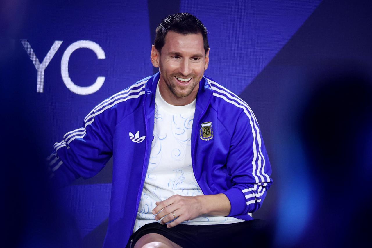 FIFA World Cup 2026 - Argentina's Emiliano Martinez, Lionel Scaloni and Lionel Messi at the Fanatics Fest