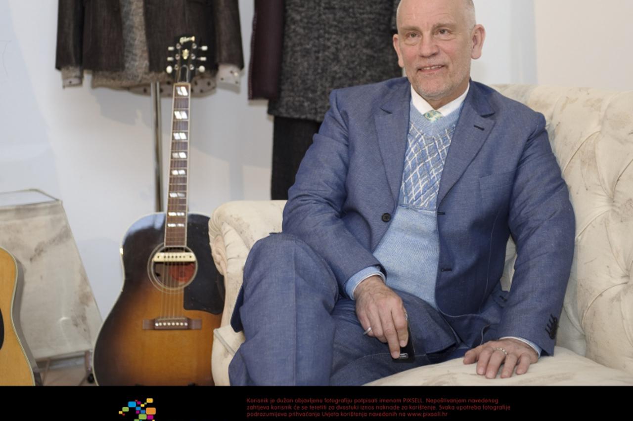 'Actor/designer John Malkovich attends Eco_Design Magazine And Opificio JM di Prato Cocktail Party during Milan Design Week 2011 held at Museo Pecci Milano on April 14, 2011 in Milan, Italy. Photo: Pr