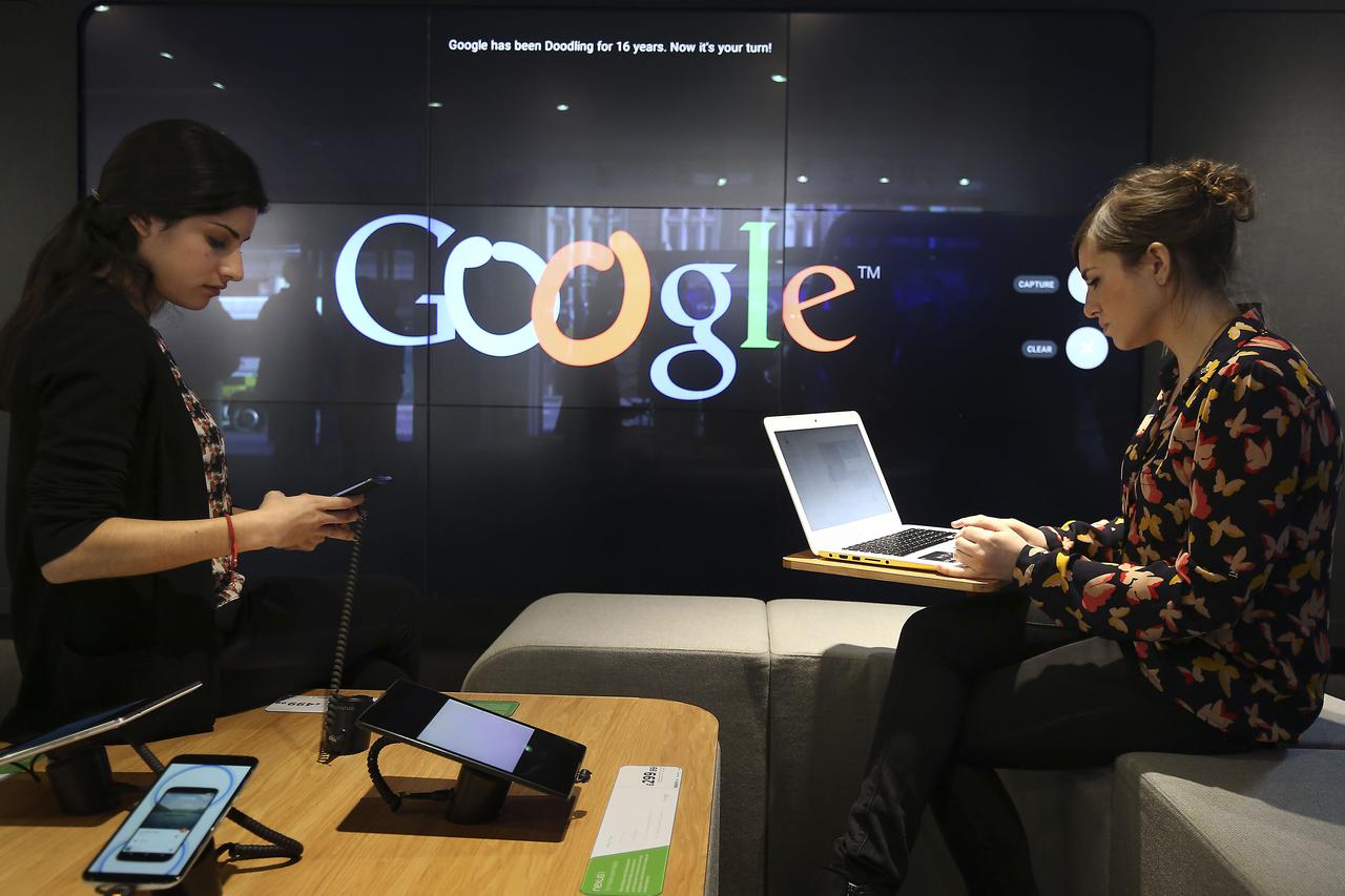 New Google store opens  Customers at the new Google store in Currys PC World in London.Philip Toscano 