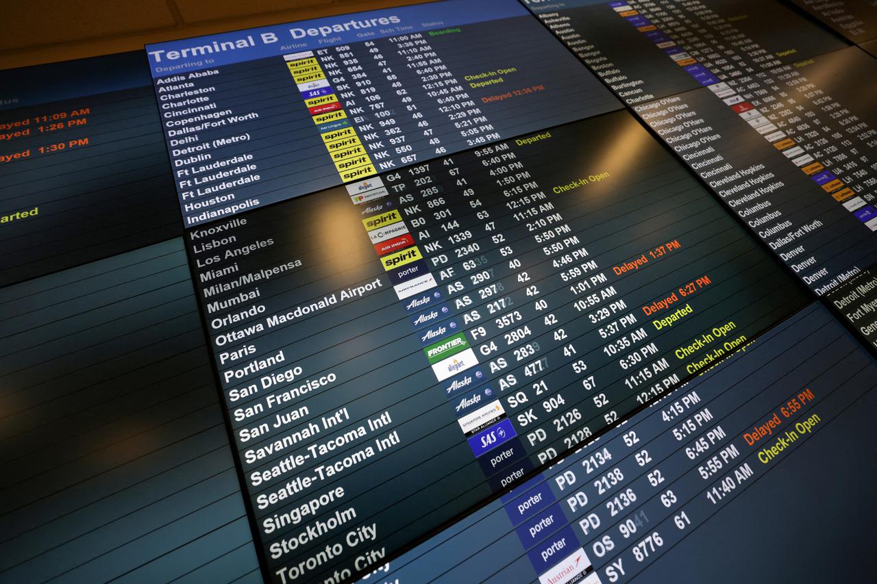 FILE PHOTO: Departures display at Newark International Airport following the closure of London Heathrow Airport, in Newark