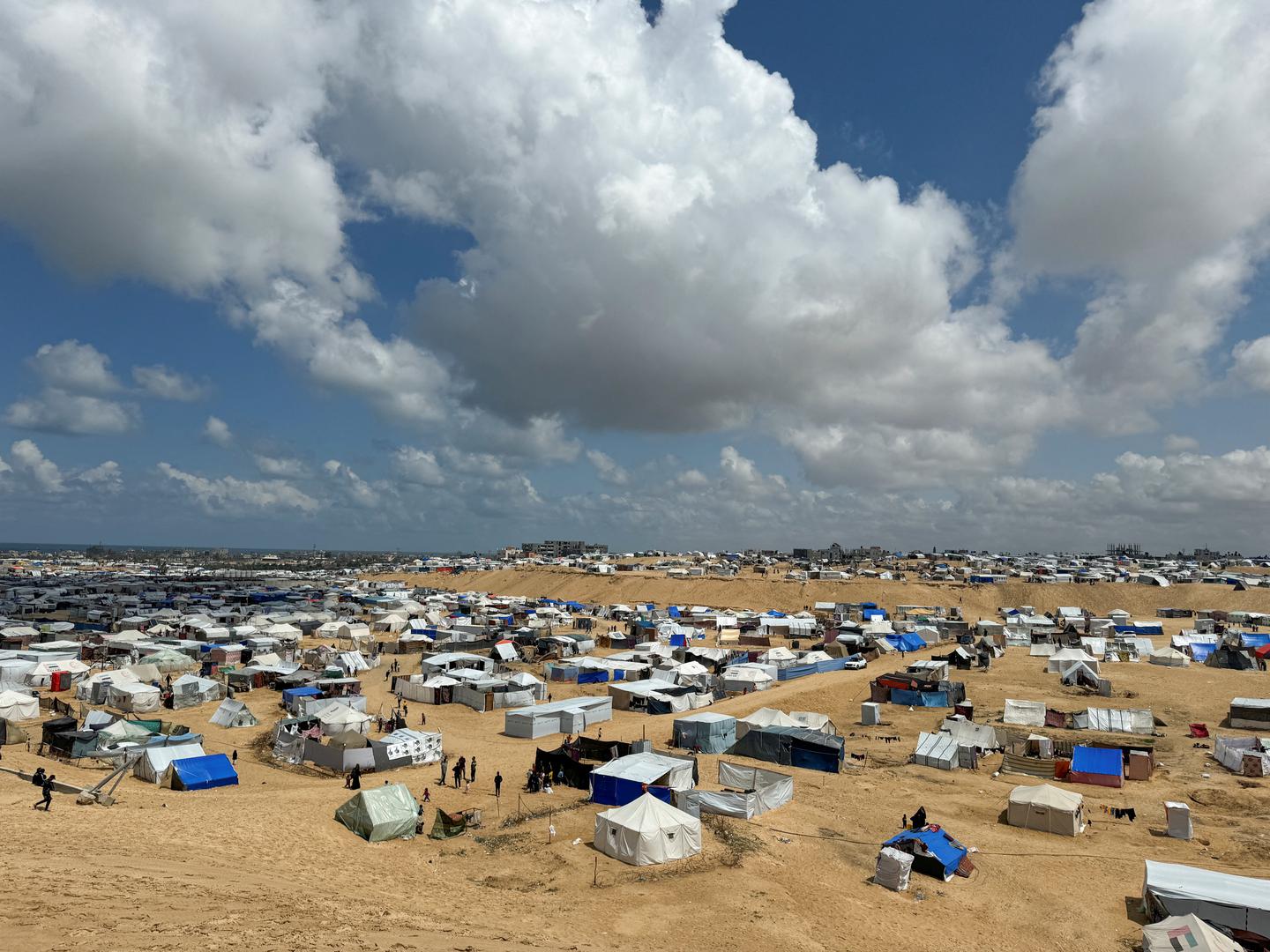 Palestinians, who fled their houses due to Israeli strikes, take shelter in a tent camp, amid the ongoing conflict between Israel and the Palestinian Islamist group Hamas, on the Muslim holiday of Eid al-Fitr, at the border with Egypt in Rafah, in the southern Gaza Strip, April 10, 2024. REUTERS/Mohammed Salem Photo: MOHAMMED SALEM/REUTERS