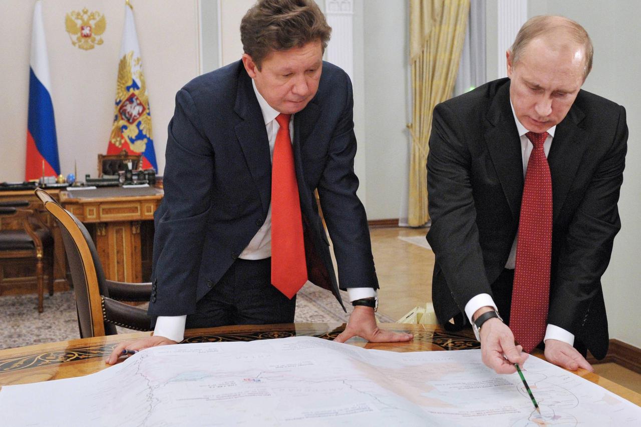 Russia's President Vladimir Putin (R) meets with Gazprom's Chief Executive Alexei Miller at the Novo-Ogaryovo residence outside Moscow, in this October 29, 2012 file photo. To match Special Report RUSSIA-CAPITALISM/GAS  REUTERS/Aleksey Nikolskyi/RIA Novos