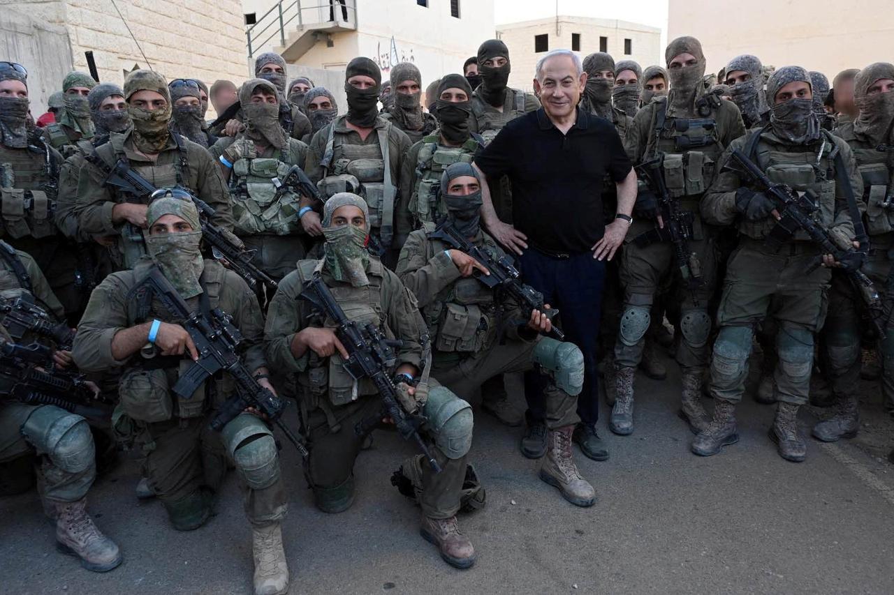 Israeli Prime Minister Benjamin Netanyahu meets with soldiers in Tze'elim