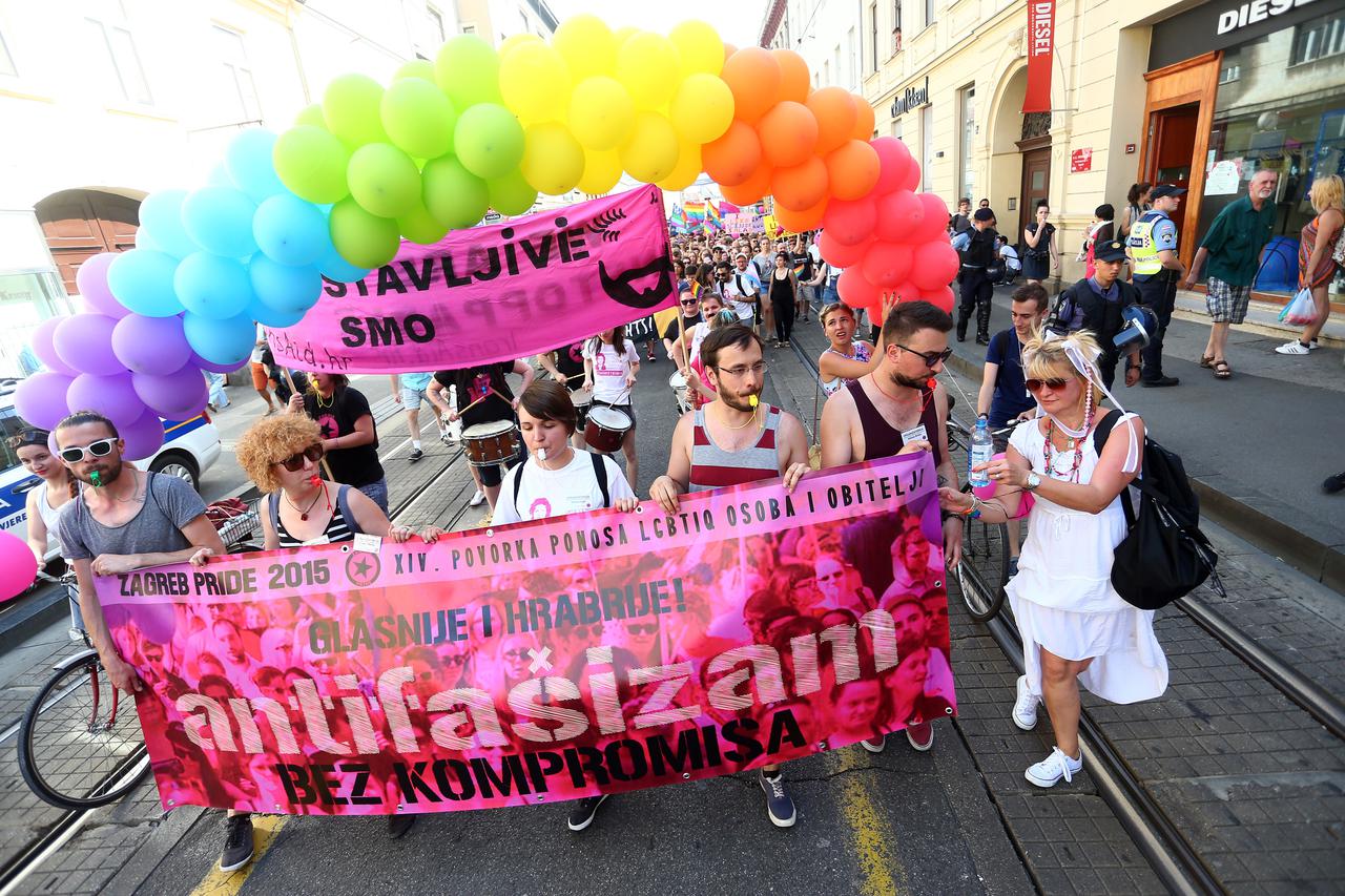 13.06.2015., Zagreb - XIV. Povorka ponosa LGBTIQ osoba i obitelji pod sloganom Glasnije i hrabrije: Antifasizam - bez kompromisa!. Sudionici povorke okupili su se na Trgu Marka Marulica odakle su krenuli sredisnjim zagrebackim ulicama do parka Ribnjak gdj