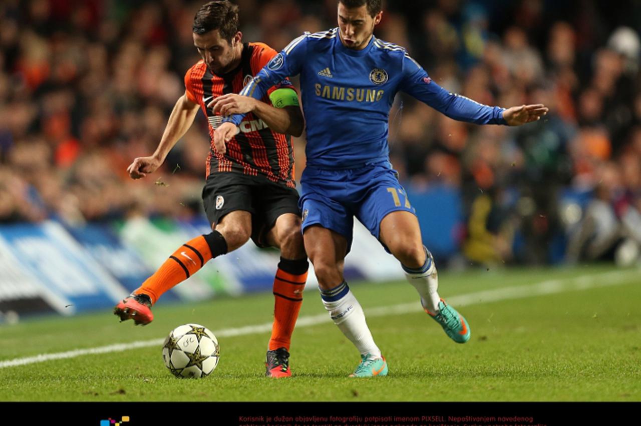 'Shakhtar Donetsk\'s Darijo Srna (left) and Chelsea\'s Eden Hazard battle for the ball Photo: Press Association/Pixsell'