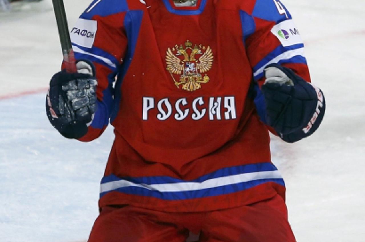 'Russia\'s Alexander Radulov celebrates after scoring against Latvia during their 2013 IIHF Ice Hockey World Championship preliminary round match at the Hartwall Arena in Helsinki May 4, 2013.  REUTER