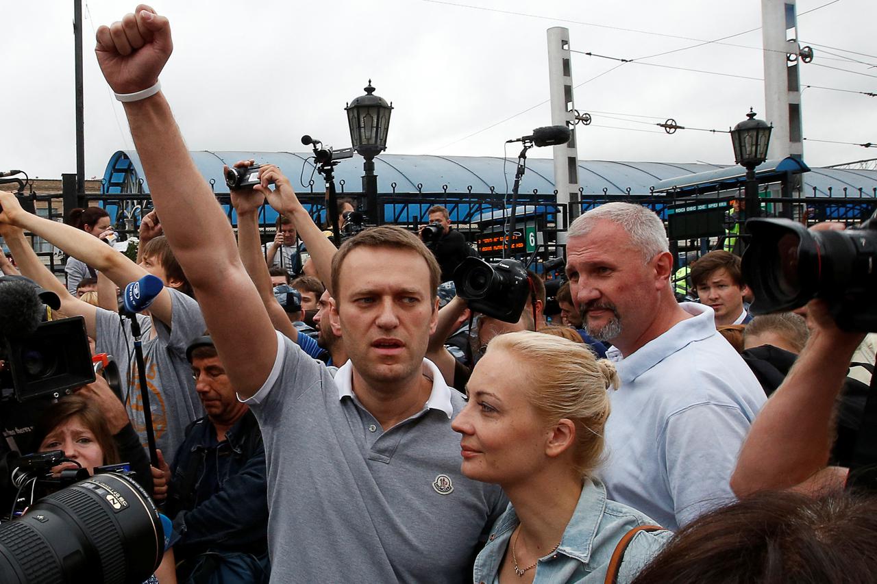 FILE PHOTO: Russian protest leader Alexei Navalny addresses his supporters after arriving from Kirov at a railway station in Moscow