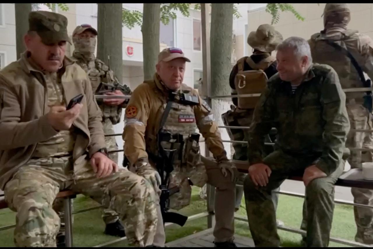 Founder of Wagner private mercenary group Yevgeny Prigozhin and Russian Wagner Group fighters at the headquarters of the Southern Military District of the Russian Armed Forces in Rostov-on-Don