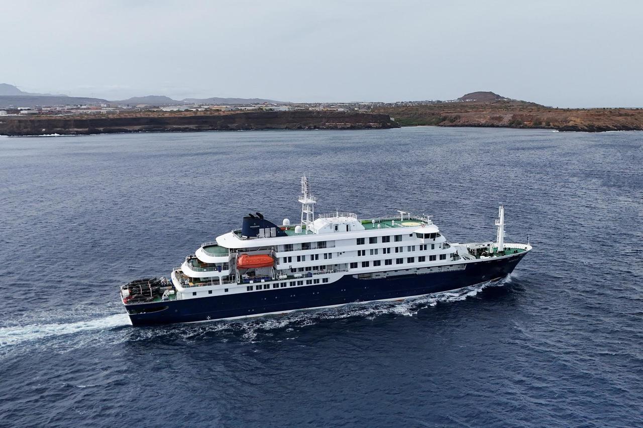 A drone view of the cruise ship MV Hondius, carrying passengers suspected of having cases of hantavirus on board, leaves Praia