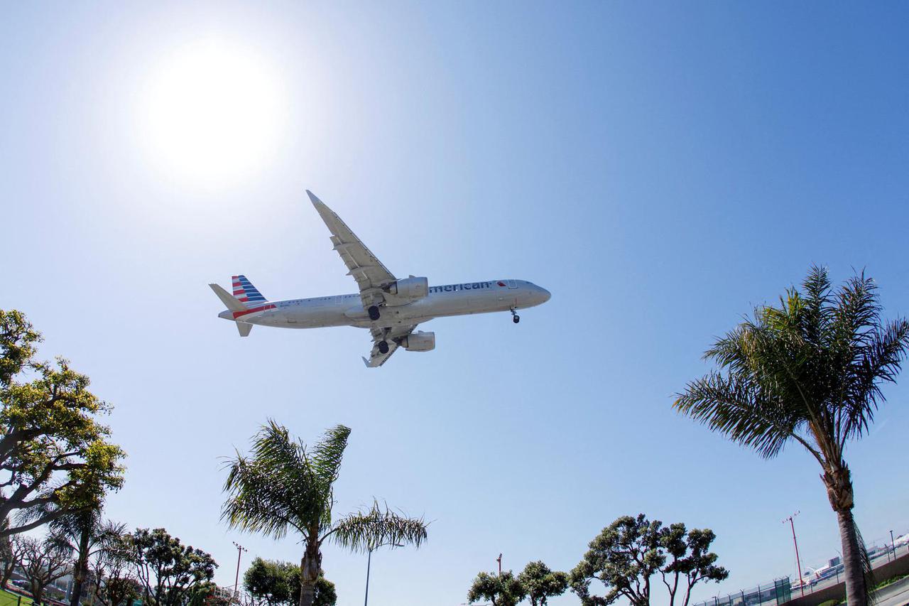 FILE PHOTO: An American Airlines passenger jet approaches to land at LAX in Los Angeles