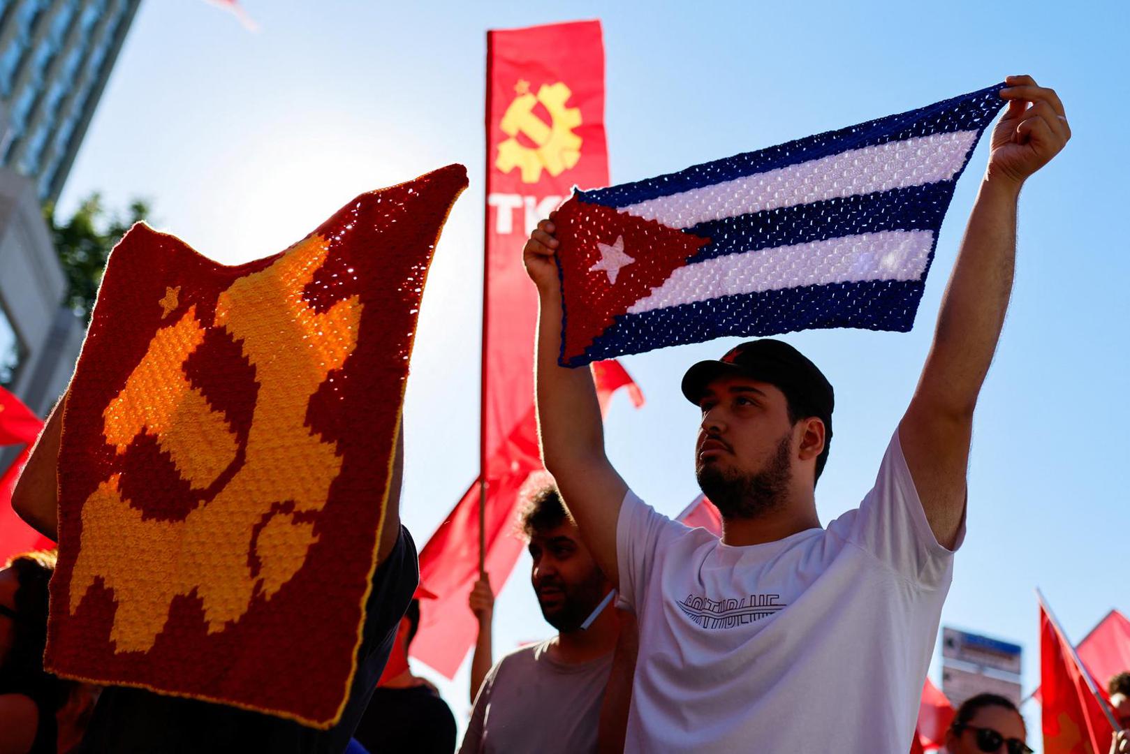 People hold crocheted flags of Greece and Communist Party of Turkey (TKP) during a protest, ahead of NATO leaders' summit, in Istanbul, Turkey, July 5, 2026. REUTERS/Kemal Aslan Photo: KEMAL ASLAN/REUTERS