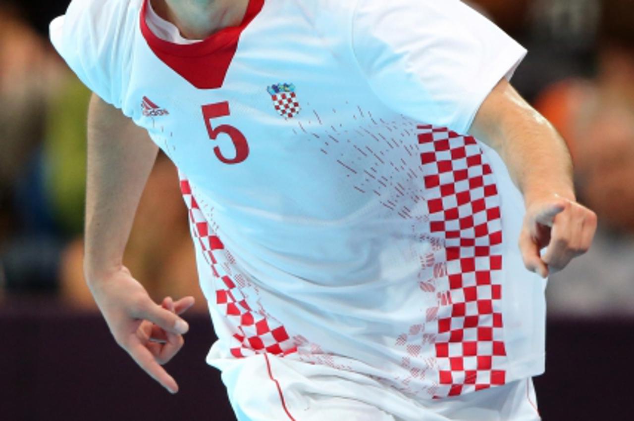'31.07.2012., London - Ljetne Olimpijske igre2012, rukometna utakmica Hrvatska - Srbija. Domagoj Duvnjak. Photo: Igor Kralj/PIXSELL'