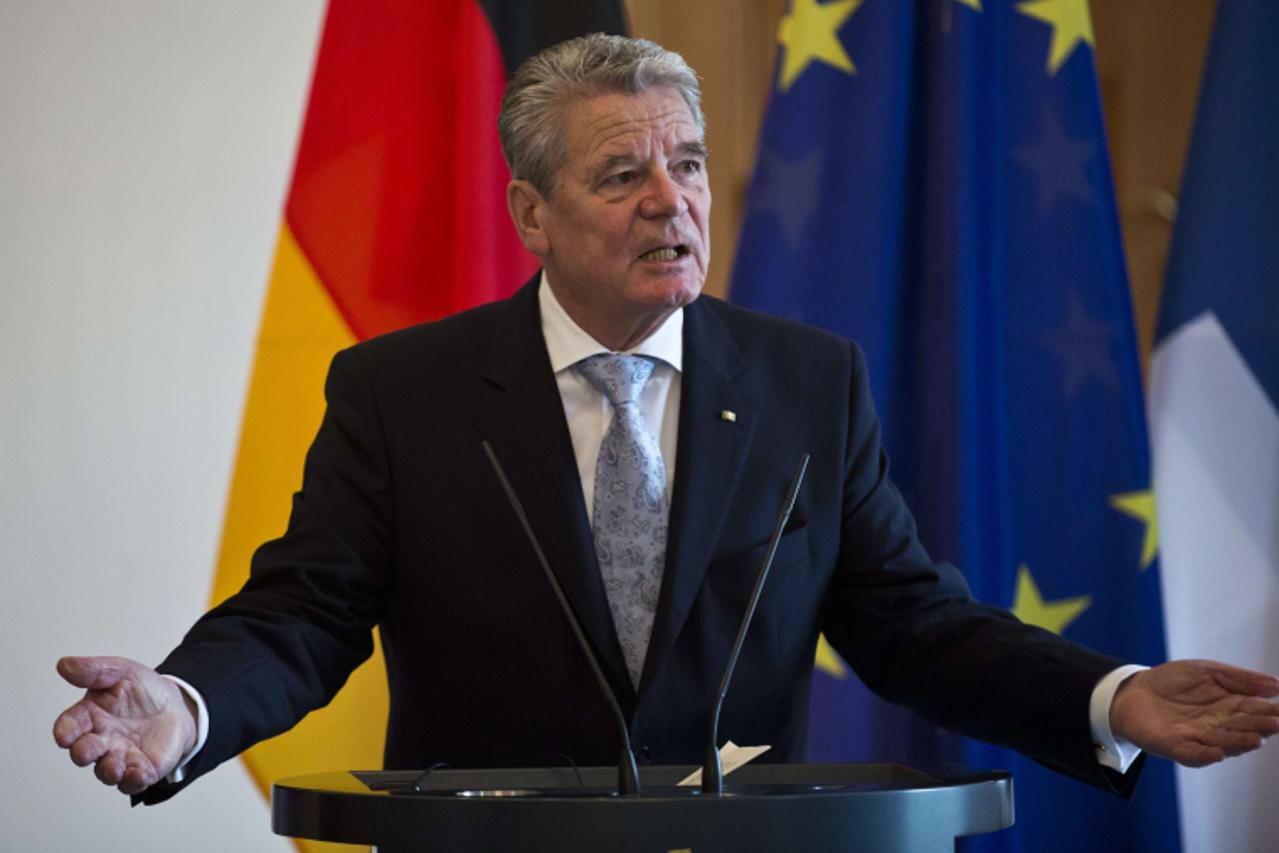 'German President Joachim Gauck addresses a press conference following talks with his Finnish counterpart  at the presidential palace in Berlin November 8, 2012. Finland's President Sauli Niinisto he