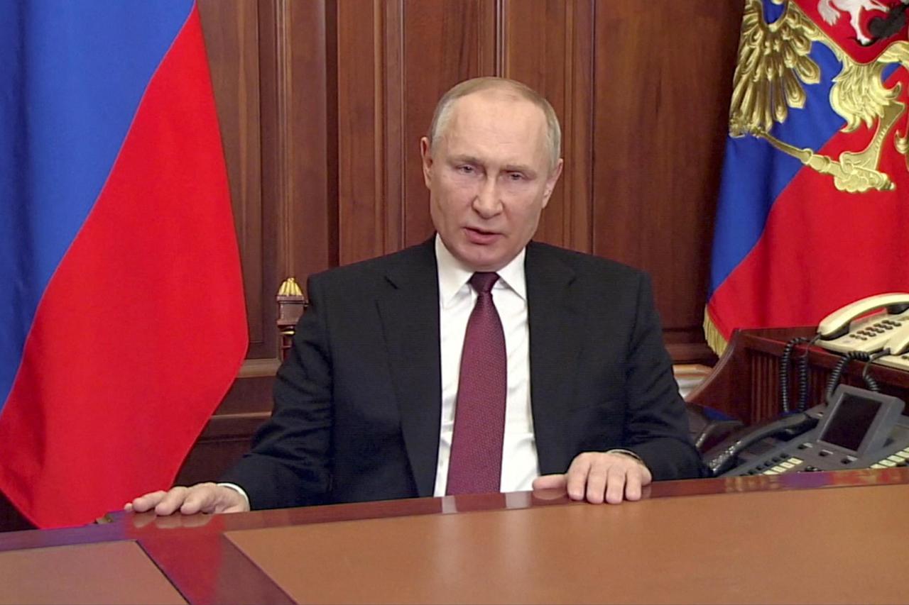 Russian President Vladimir Putin delivers a video address in Moscow