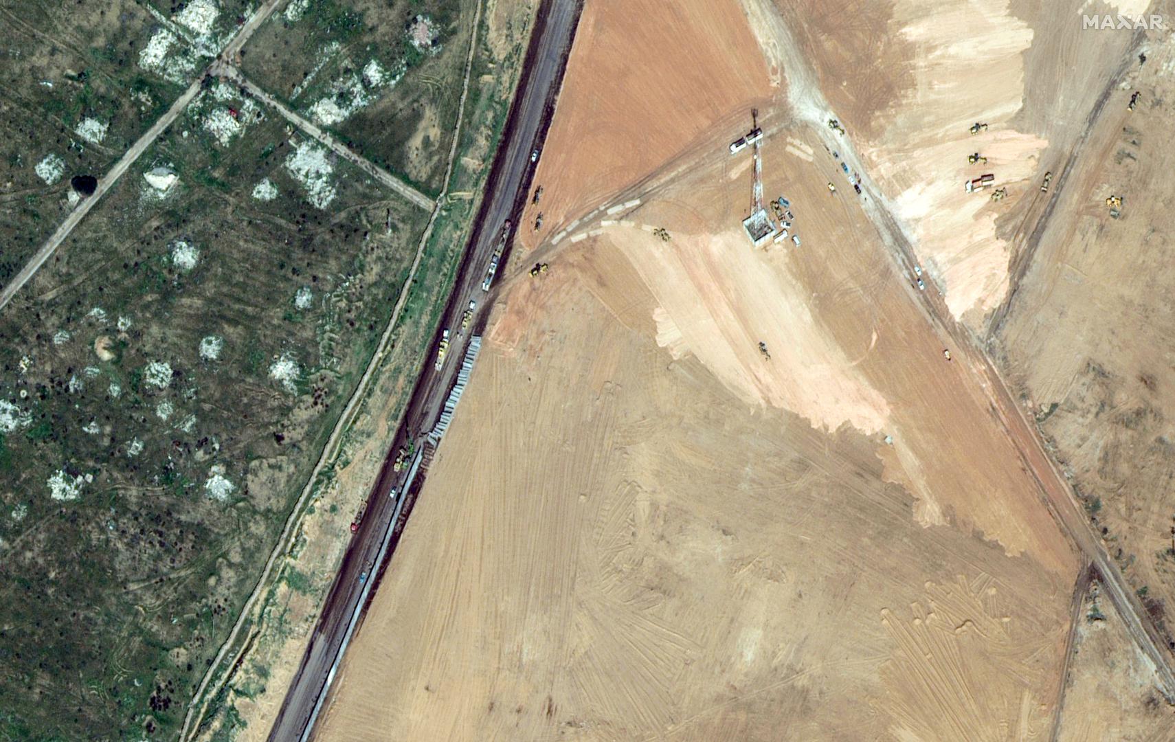 A satellite image shows the construction of a wall along the Egypt-Gaza border near Rafah, February 15, 2024. Maxar Technologies/Handout via REUTERS    THIS IMAGE HAS BEEN SUPPLIED BY A THIRD PARTY. NO RESALES. NO ARCHIVES. MANDATORY CREDIT. DO NOT OBSCURE LOGO. Photo: MAXAR TECHNOLOGIES/REUTERS