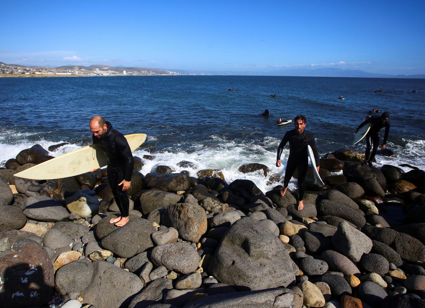 Local surfers leave as they take part in a demonstration calling for the authorities to solve the disappearances of U.S. and Australian surfers in Ensenada after Mexican authorities said the parents of the missing tourists arrived in Mexico to try to identify the dead bodies believed to be their children, in Ensenada, Mexico May 5, 2024. REUTERS/Jorge Duene Photo: JORGE DUENES/REUTERS