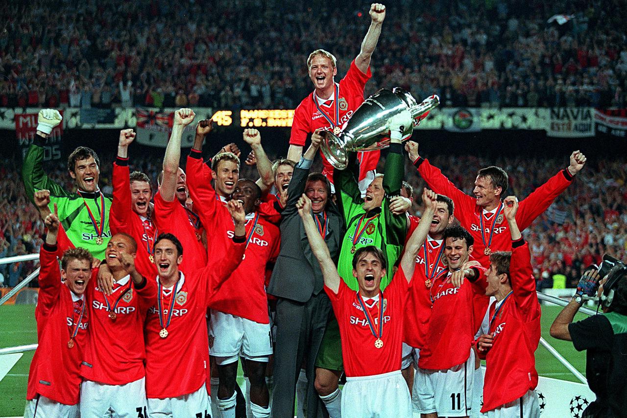 FILE PHOTO: Manchester United's players celebrate with the European Cup following their dramatic 2-1 victory over Bayern Munich in the final at Camp Nou in Barcelona, Spain.