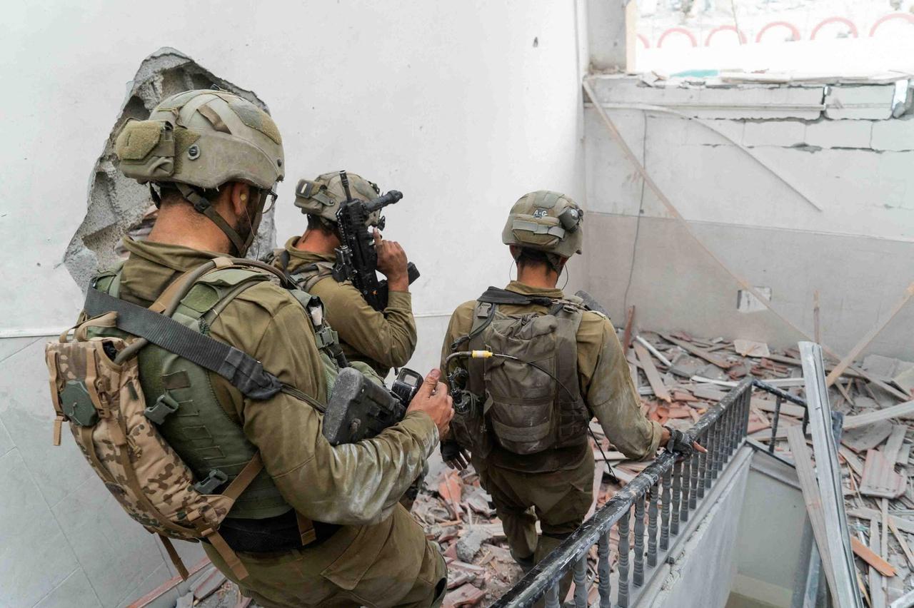 Israeli soldiers take position in the Gaza Strip