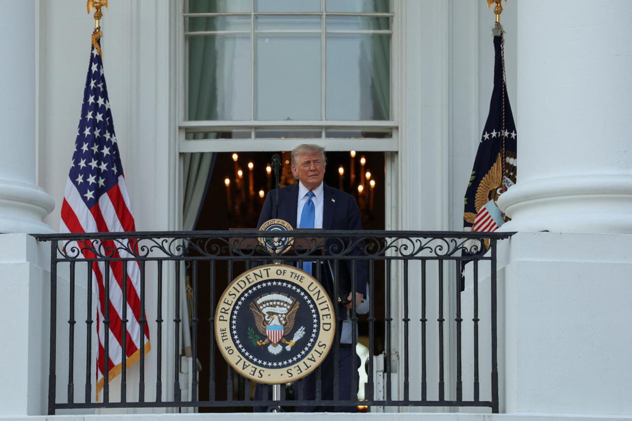 U.S. President Donald Trump attends a "Summer Soiree" held on the South Lawn of the White House in Washington