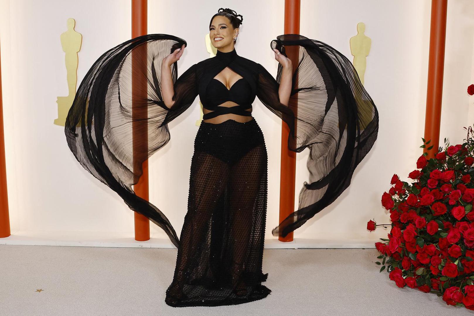 Ashley Graham poses on the champagne-colored red carpet during the Oscars arrivals at the 95th Academy Awards in Hollywood, Los Angeles, California, U.S., March 12, 2023. REUTERS/Eric Gaillard Photo: ERIC GAILLARD/REUTERS