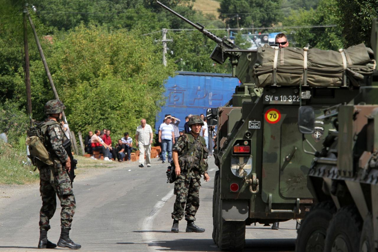 \'30.07.2011., Mitrovica, Kosovo, - Albanci na sjeveru Kosova odsjeceni su od ostatka zemlje zbog srpskih barikada na regionalnim prometnicama. Slovenski KFOR na srpskoj barikadi u Rudarima. Photo: An