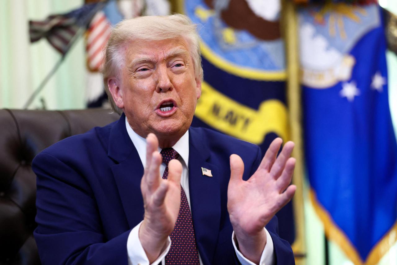 U.S. President Trump speaks after signing an executive order at the Oval Office of the White House, in Washington